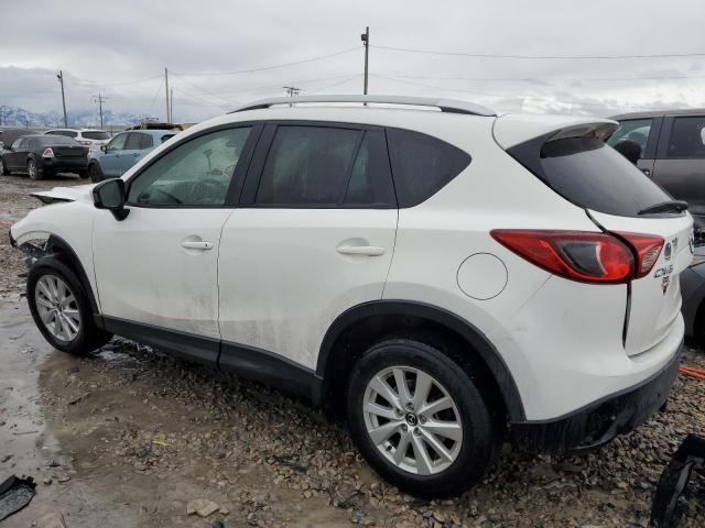 Photo 2 from auction – 2014 MAZDA CX-5 TOURI with VIN JM3KE2CY0E0350198