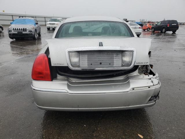Photo 6 from auction – 2003 LINCOLN TOWN CAR E with VIN 1LNHM81W63Y667116