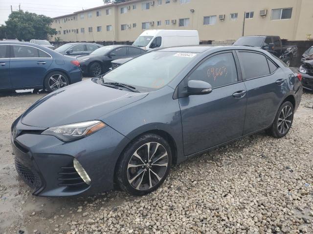 TOYOTA COROLLA L 2018 with VIN 2T1BURHE2JC981649 - Photo from auction