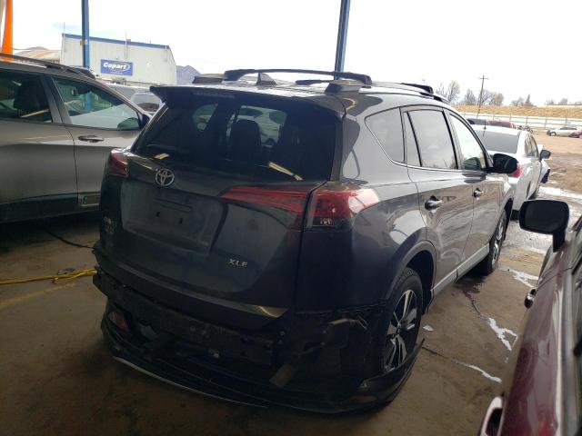 Photo 3 from auction – 2016 TOYOTA RAV4 XLE with VIN JTMWFREV7GD090672