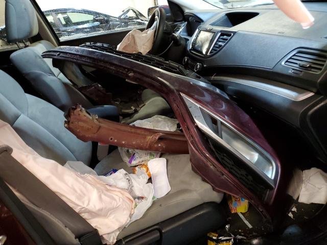 Photo 13 from auction – 2015 HONDA CR-V EX with VIN 2HKRM3H54FH543019