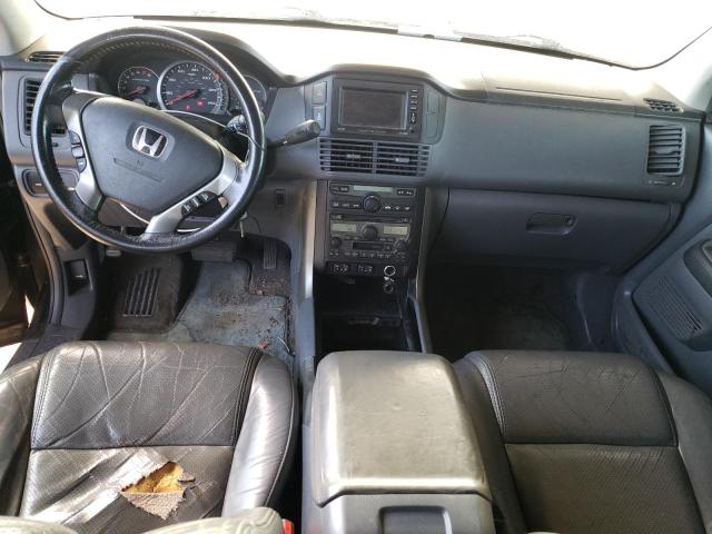 Photo 8 from auction – 2004 HONDA PILOT with VIN 2HKYF18784H585279
