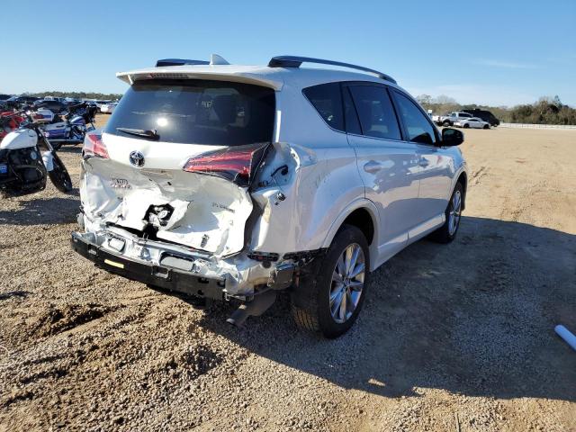 Photo 3 from auction – 2018 TOYOTA RAV4 LIMIT with VIN 2T3YFREV5JW429772