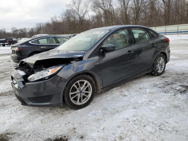 FORD FOCUS SE 2018 with VIN 1FADP3F28JL203019 - Photo from auction