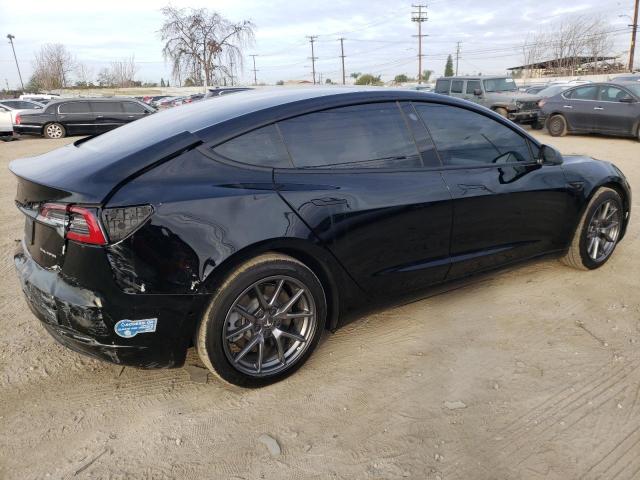 Photo 3 from auction – 2022 TESLA MODEL 3 with VIN 5YJ3E1EB9NF130821