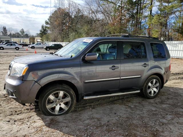 HONDA PILOT TOUR 2015 with VIN 5FNYF4H98FB061778 - Photo from auction
