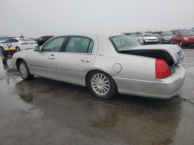 Photo 2 from auction – 2003 LINCOLN TOWN CAR E with VIN 1LNHM81W63Y667116