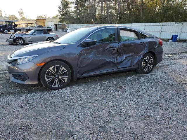 HONDA CIVIC EX 2017 with VIN 2HGFC1F35HH637077 - Photo from auction