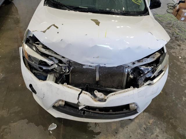 Photo 11 from auction – 2015 TOYOTA COROLLA L with VIN 5YFBURHE2FP293609