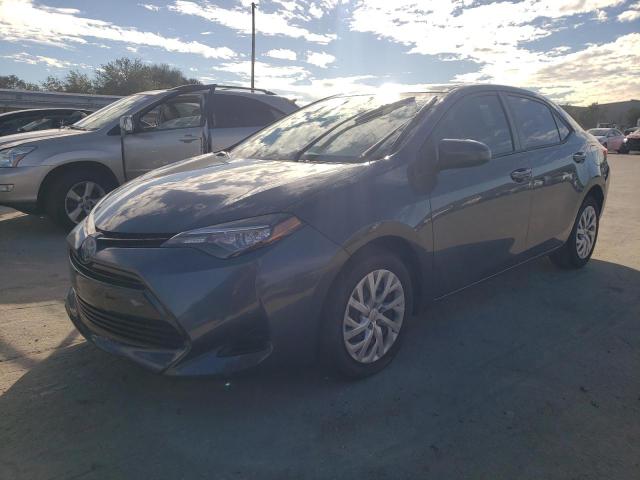TOYOTA COROLLA L 2017 with VIN 2T1BURHEXHC855131 - Photo from auction
