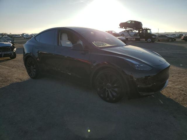 Photo 4 from auction – 2022 TESLA MODEL Y with VIN 7SAYGDEF4NF520491