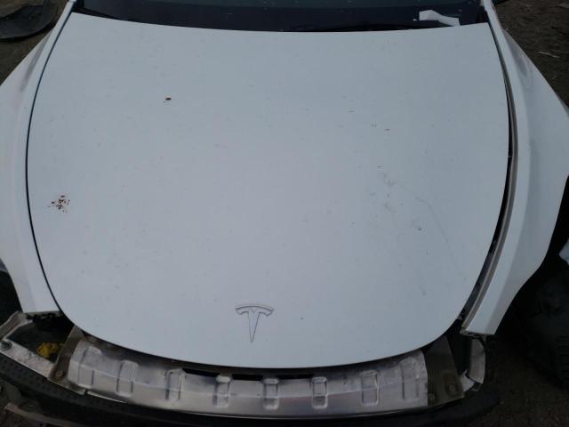 Photo 11 from auction – 2021 TESLA MODEL Y with VIN 5YJYGAEE4MF211329