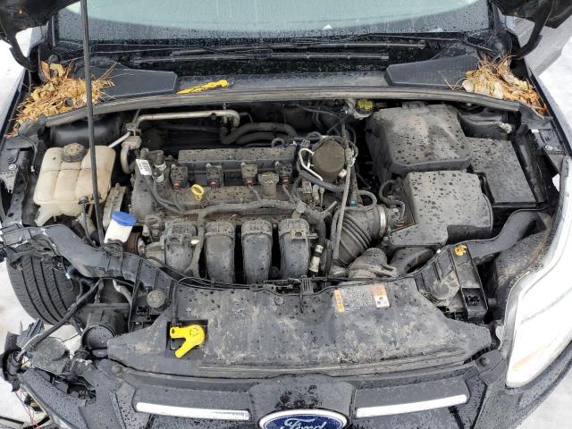 Photo 11 from auction – 2014 FORD FOCUS SE with VIN 1FADP3F2XEL390303