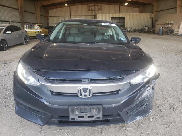 Photo 5 from auction – 2018 HONDA CIVIC LX with VIN 19XFC2F56JE007544