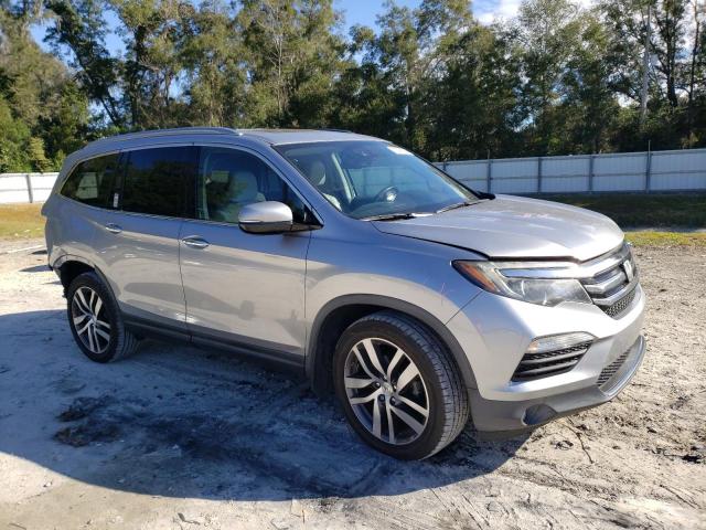 Photo 4 from auction – 2016 HONDA PILOT ELIT with VIN 5FNYF6H02GB092961