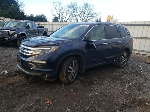 HONDA PILOT TOUR 2018 with VIN 5FNYF6H96JB011076 - Photo from auction