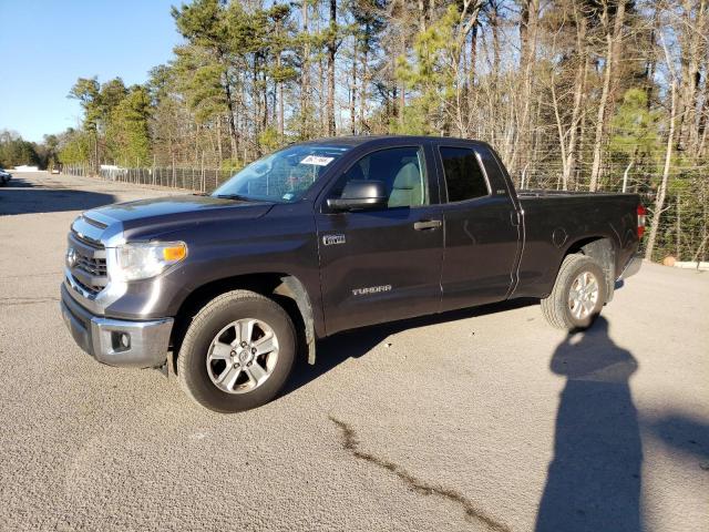 TOYOTA TUNDRA DOU 2014 with VIN 5TFRY5F1XEX169504 - Photo from auction
