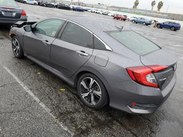 Photo 2 from auction – 2016 HONDA CIVIC TOUR with VIN 2HGFC1F95GH636952