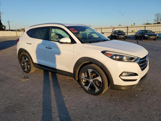 Photo 4 from auction – 2016 HYUNDAI TUCSON LIM with VIN KM8J33A29GU095122