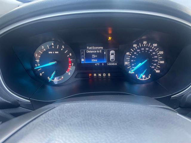 Photo 8 from auction – 2014 FORD FUSION SE with VIN 3FA6P0H73ER144159