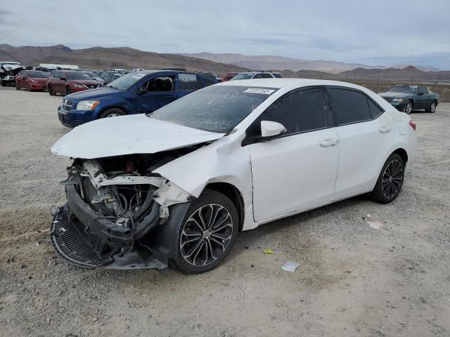TOYOTA COROLLA L 2014 with VIN 5YFBURHE0EP033000 - Photo from auction