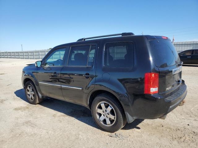 Photo 2 from auction – 2011 HONDA PILOT TOUR with VIN 5FNYF4H95BB084817