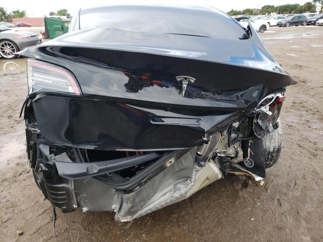 Photo 6 from auction – 2022 TESLA MODEL 3 with VIN 5YJ3E1EBXNF103627