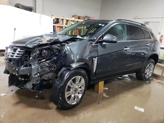 CADILLAC SRX 2014 with VIN 3GYFNAE39ES679667 - Photo from auction