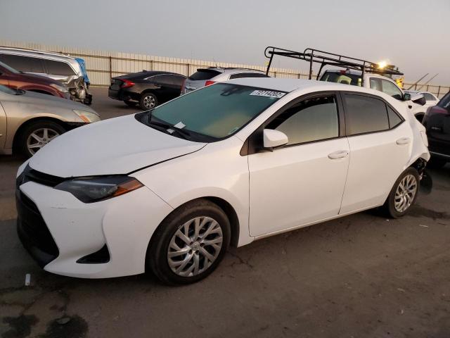 TOYOTA COROLLA L 2018 with VIN 2T1BURHE9JC070766 - Photo from auction