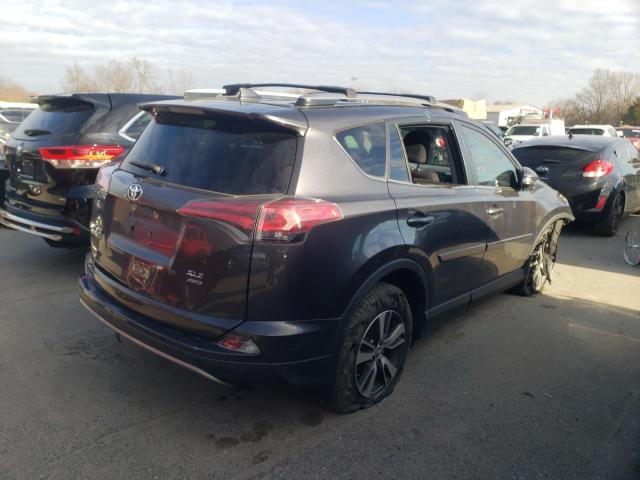 Photo 3 from auction – 2017 TOYOTA RAV4 XLE with VIN JTMRFREV3HJ172527