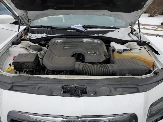 Фото 11 с аукциона – 2014 CHRYSLER 300 S с VIN 2C3CCABG1EH357103