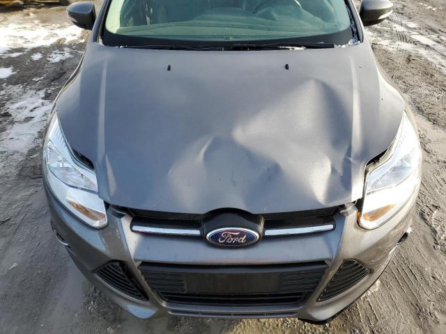 Foto 11 de la subasta – 2014 FORD FOCUS SE con VIN 1FADP3F26EL218091