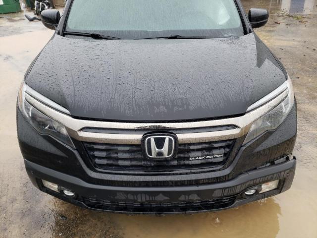 Photo 11 from auction – 2019 HONDA RIDGELINE with VIN 5FPYK3F81KB028994