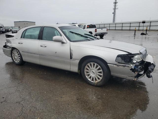 Photo 4 from auction – 2003 LINCOLN TOWN CAR E with VIN 1LNHM81W63Y667116