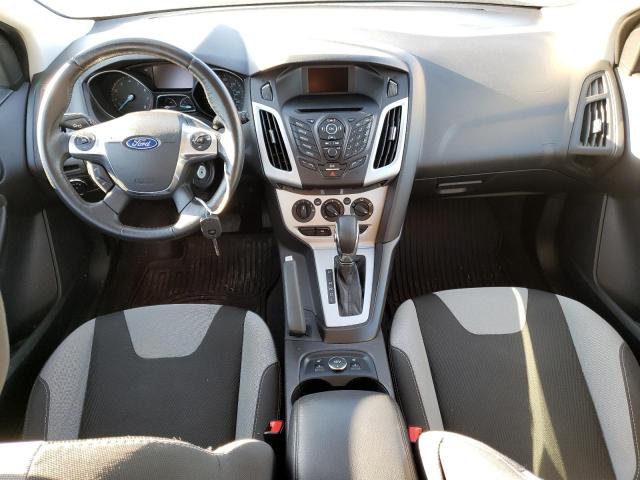 Photo 8 from auction – 2014 FORD FOCUS SE with VIN 1FADP3K2XEL353421