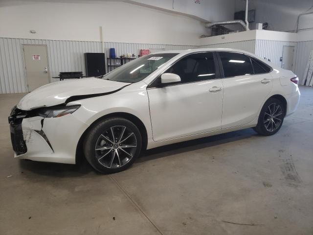 TOYOTA CAMRY LE 2017 with VIN 4T1BF1FK2HU335170 - Photo from auction