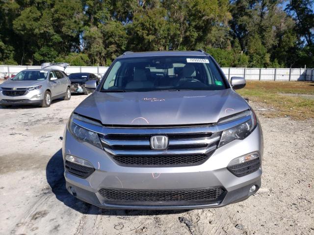 Photo 5 from auction – 2016 HONDA PILOT ELIT with VIN 5FNYF6H02GB092961