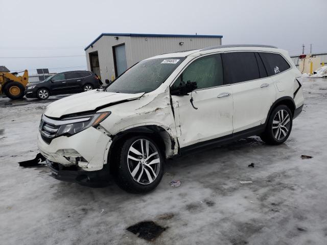 HONDA PILOT TOUR 2016 with VIN 5FNYF5H97GB014863 - Photo from auction