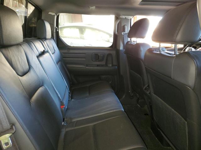Photo 11 from auction – 2013 HONDA RIDGELINE with VIN 5FPYK1F57DB005748