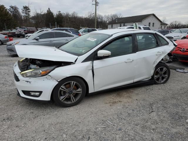 FORD FOCUS SE 2017 with VIN 1FADP3FE3HL311634 - Photo from auction