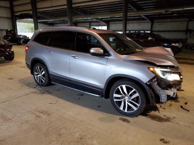 Photo 4 from auction – 2016 HONDA PILOT ELIT with VIN 5FNYF6H09GB005945