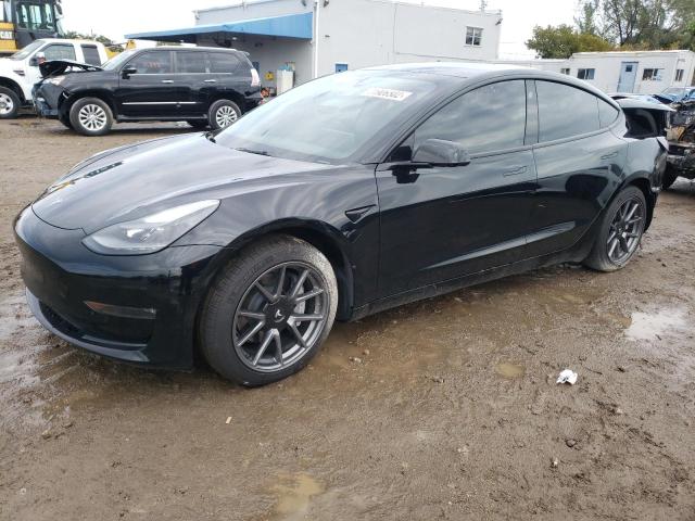 TESLA MODEL 3 2022 with VIN 5YJ3E1EBXNF103627 - Photo from auction