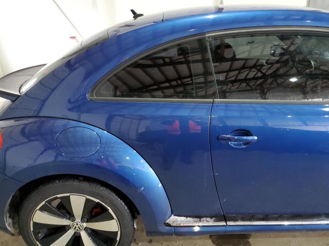Photo 10 from auction – 2013 VOLKSWAGEN BEETLE TUR with VIN 3VWVA7AT1DM618237