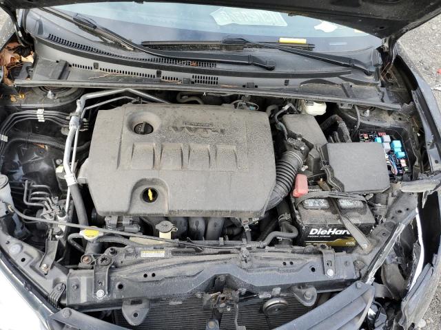 Photo 11 from auction – 2014 TOYOTA COROLLA L with VIN 2T1BURHE3EC211594