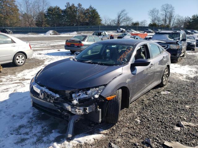 HONDA CIVIC EX 2018 with VIN 2HGFC2F70JH580429 - Photo from auction