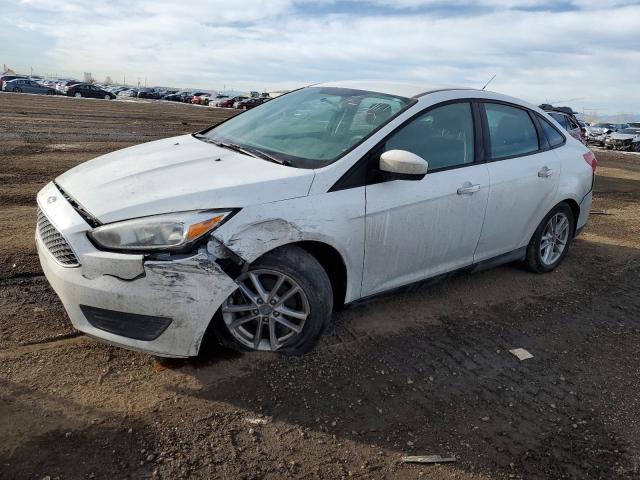FORD FOCUS SE 2018 with VIN 1FADP3F29JL312394 - Photo from auction