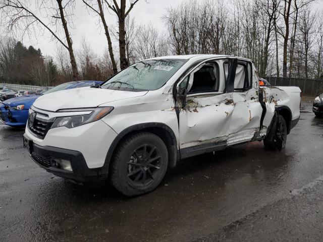 HONDA RIDGELINE 2020 with VIN 5FPYK3F5XLB015264 - Photo from auction