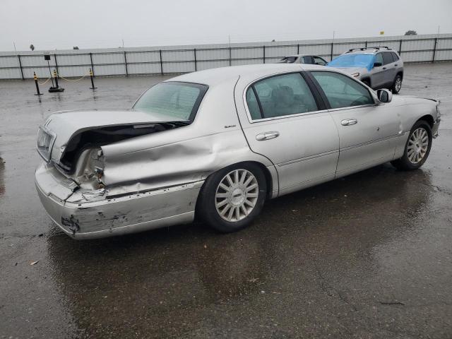 Photo 3 from auction – 2003 LINCOLN TOWN CAR E with VIN 1LNHM81W63Y667116