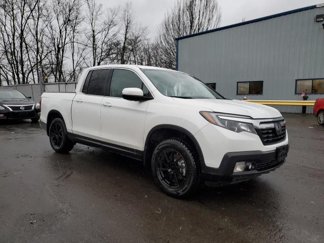 Photo 4 from auction – 2020 HONDA RIDGELINE with VIN 5FPYK3F5XLB015264