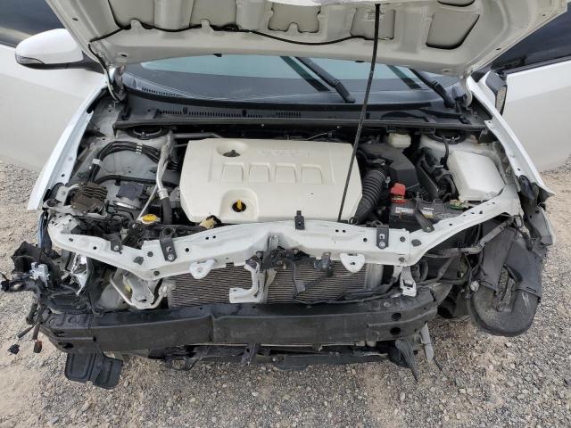 Photo 11 from auction – 2014 TOYOTA COROLLA L with VIN 5YFBURHE6EP108783